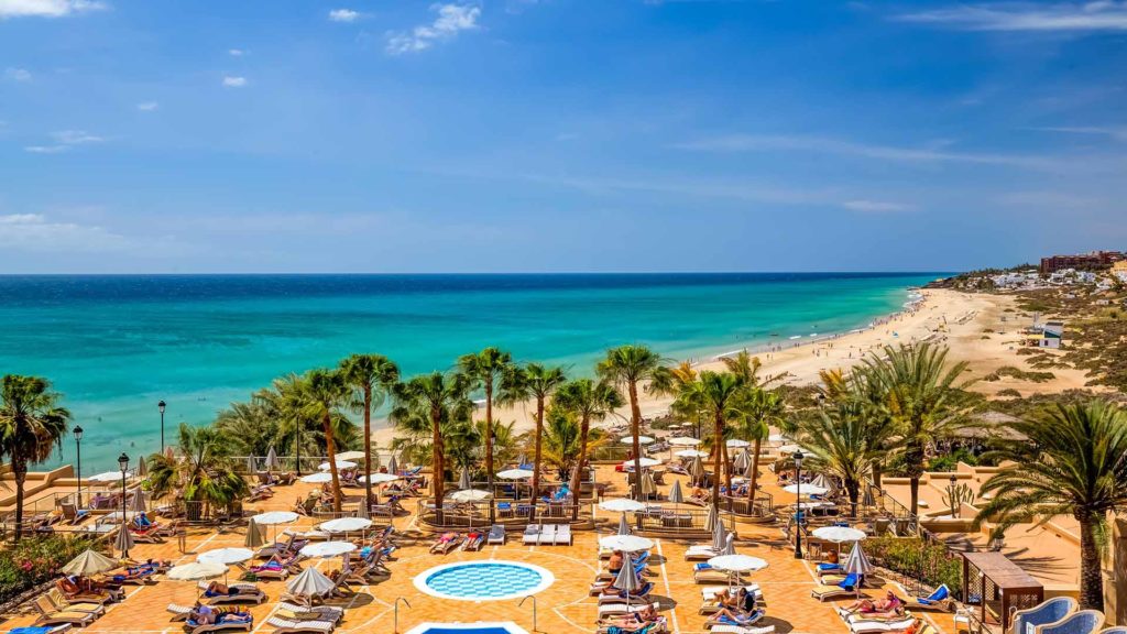 hotel view on the beach of fuerteventura with crystal clear water